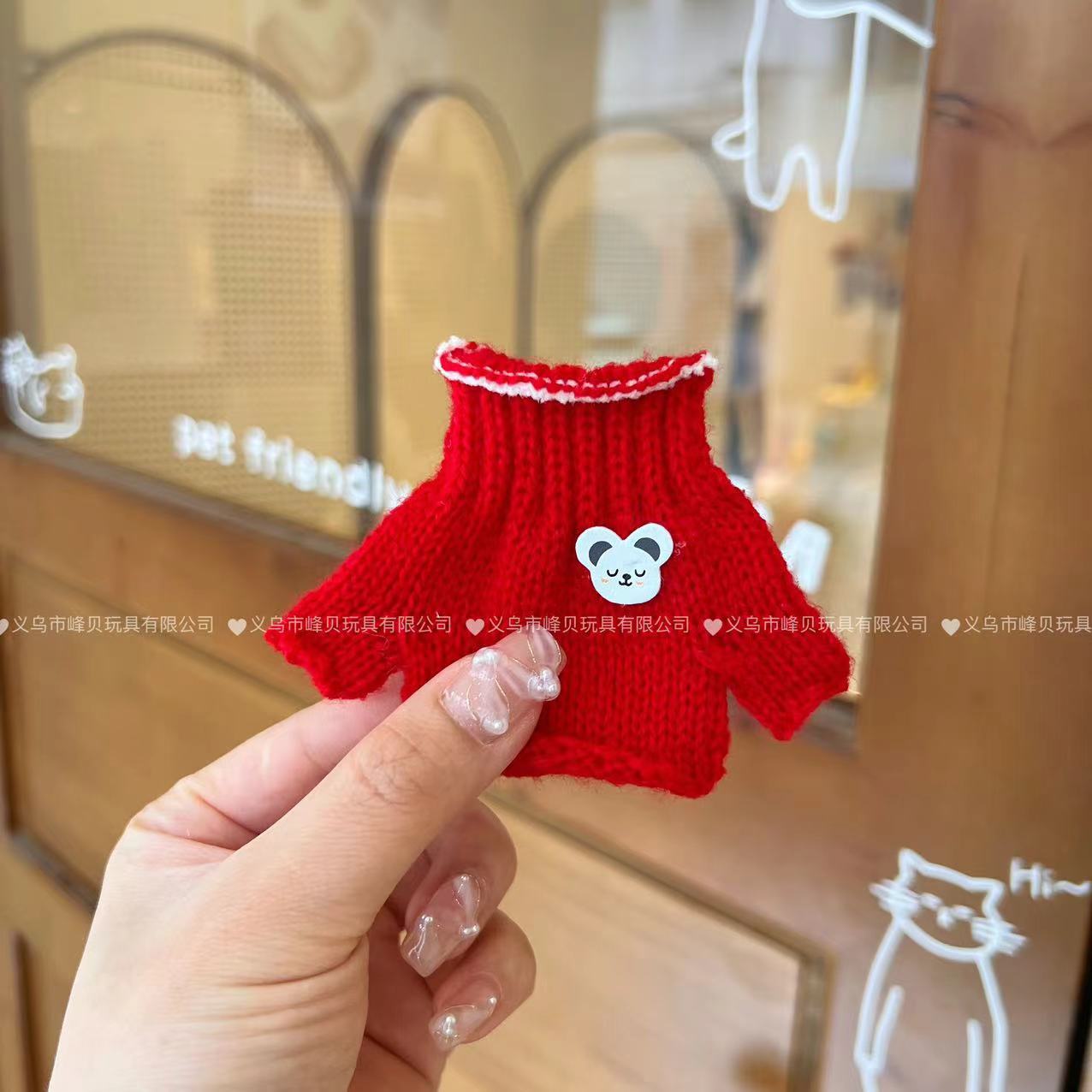 Red knitted turtleneck sweater