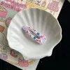 Cat water droplet BB clip