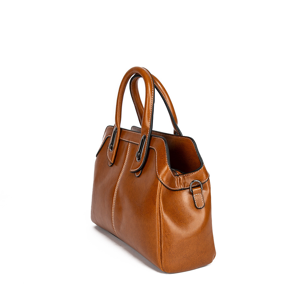 Fashionable handbag made of genuine leather with large capacity in 2024. It is a trendy stylish middle-aged mom and_voghion.com