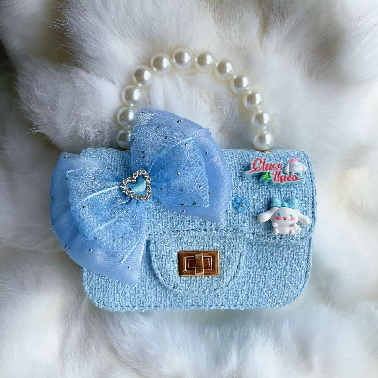 Nuevo tipo de bolsos para niños, bolsos de moda, bolsos de princesa de viento, bolsos portátiles lindos para chicas, bolsos de red para bebés.