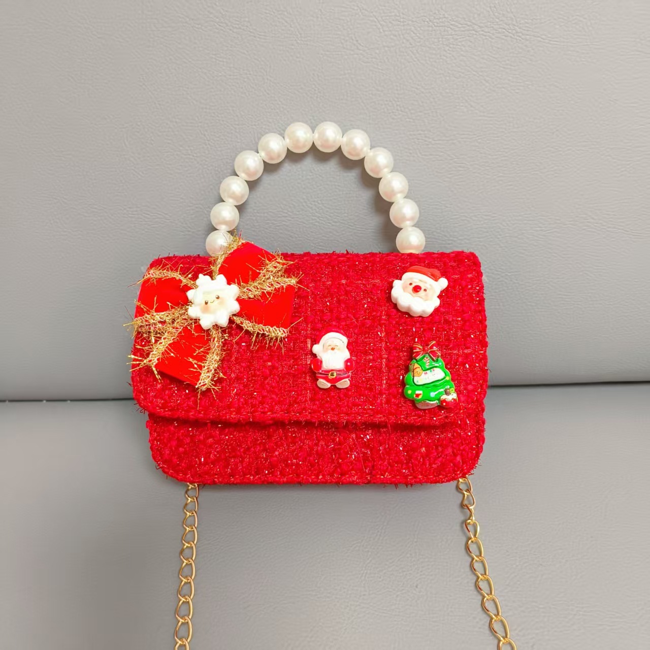 Cartera de Año Nuevo rojo arco de papá Noel bolso de perla pequeña cadena de viento fragante bolso de hombro