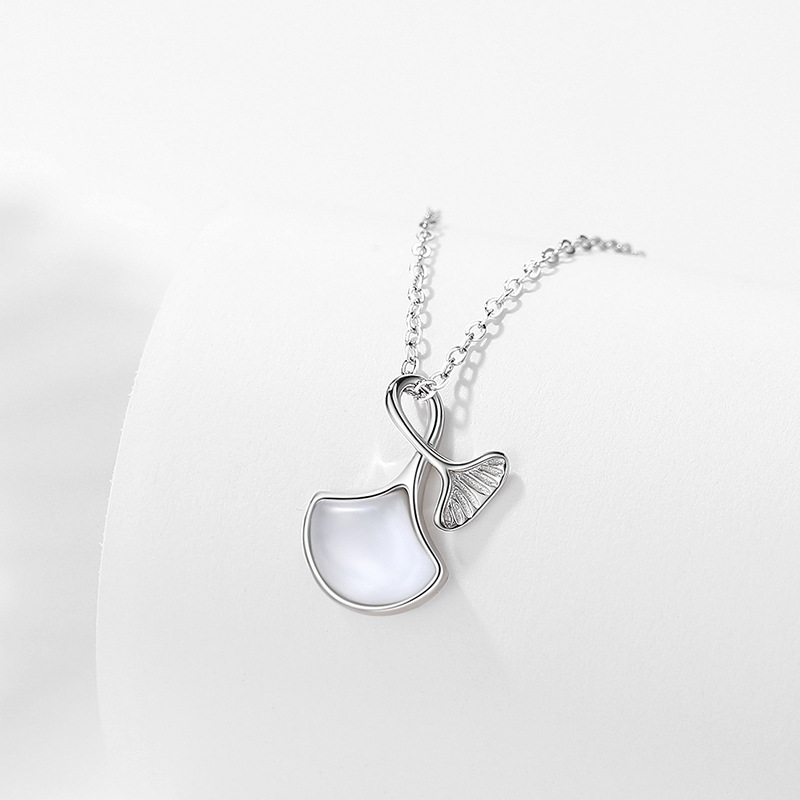 D615 oro blanco (con cadena cruzada)