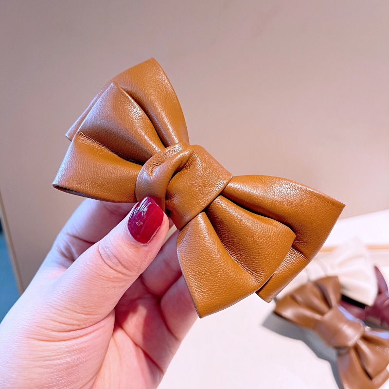 New Style Autumn And Winter French Retro Pu Leather Bow Hairpin Hairpin Temperament Hair Accessories Bangs Clip Hair Accessories display picture 7