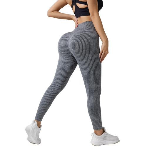 European and American-style tight high-waisted hip-lifting ribbed yoga pants—peach-bottom tummy-control workout pants for women, perfect for outdoor wear, running, and sports activities.