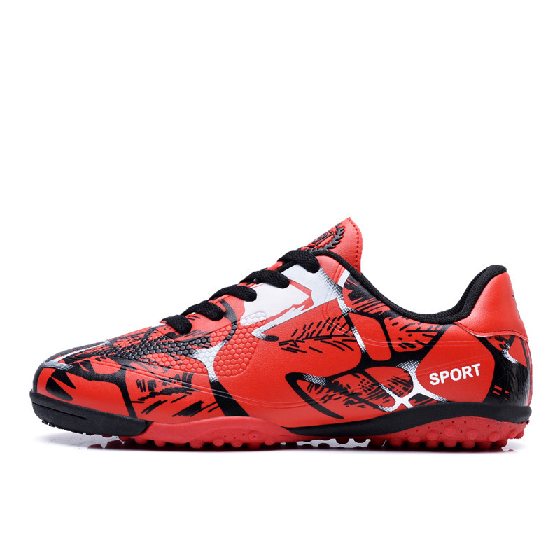 Zapatos de fútbol de clavos largos transfronterizos para niños al aire libre primavera y verano para estudiantes de primaria y secundaria zapatos de entrenamiento deportivo de clavos al por mayor