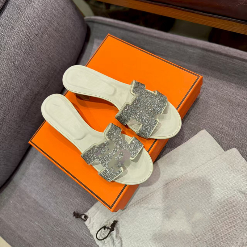 鼎羊皮の新型真皮平底ネット赤同タイプのスリッパ女性夏外着一字引きビーチカジュアル太さと涼しさ引き