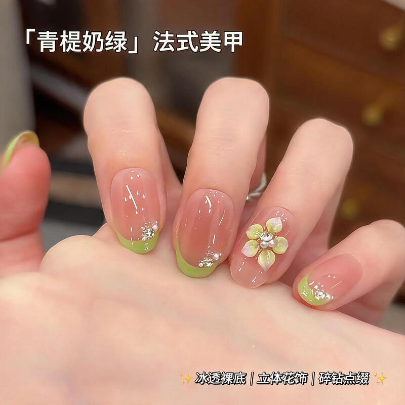 Springtime clear nude pink-green French gradient 3D hand-painted camellia, fresh, gentle, pure and alluring, creating a sense of atmosphere, press-on nails Springtime clear nude pink-green French gradient 3D hand-painted camellia, fresh, gentle, pure and alluring, creating a sense of atmosphere, press-on nails