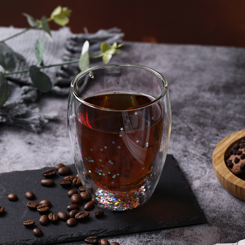 Sequinilla personalizada doble aislamiento de vidrio estrella taza logotipo personalizado taza de regalo taza de huevo transparente fabricante e