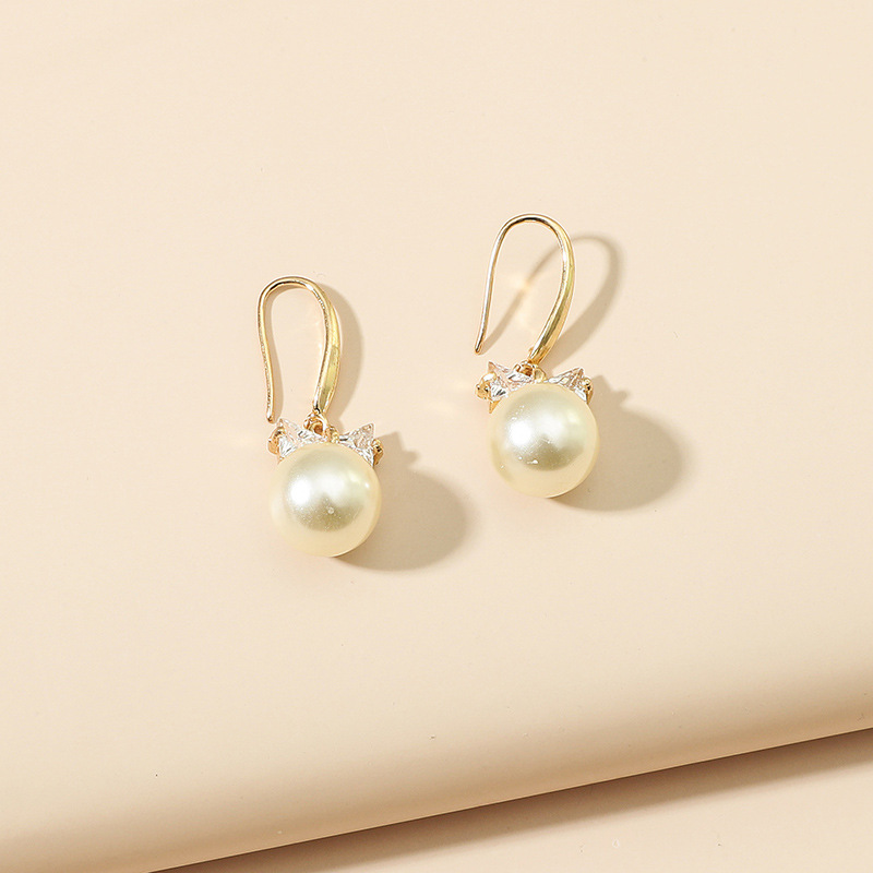 simple fashion pearl earrings bow sweet diamond alloy earringspicture2