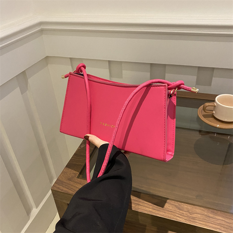 個性法式糖果色腋下2024新款時尚潮流簡約單肩洋氣手提法棍女包包