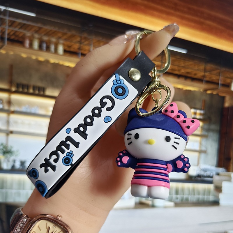 Perro de orejas grandes Melody KT gato pudín perro Kolomi caricatura de silicona llavero colgante bolsa colgante caja ciega regalo