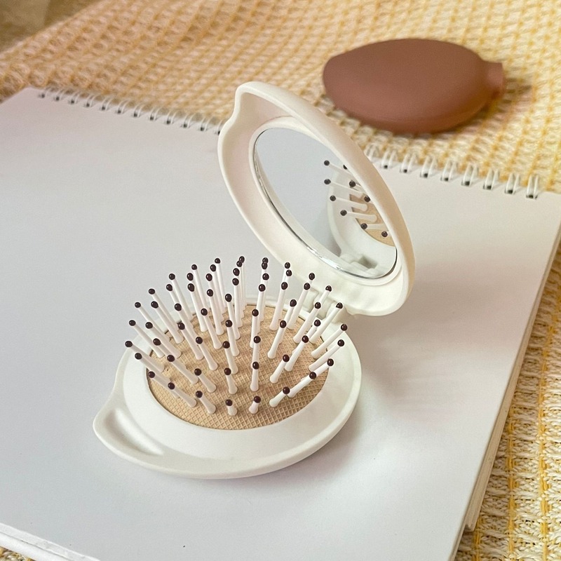かわいいミニポータブルエアクッションコームミラーツーインワンポータブル折りたたみエアバッグコーム頭皮マッサージコーム女性用|undefined