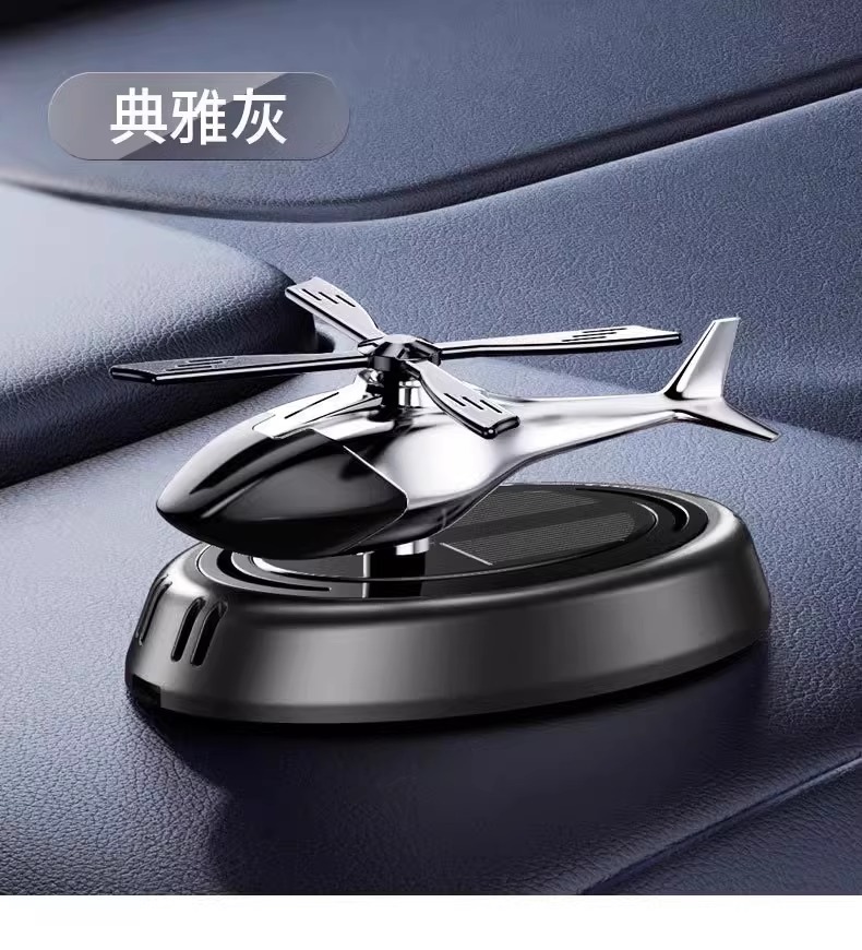 Cross-border hot selling car decoration solar rotating aircraft car perfume aromatherapy car center console decoration supplies