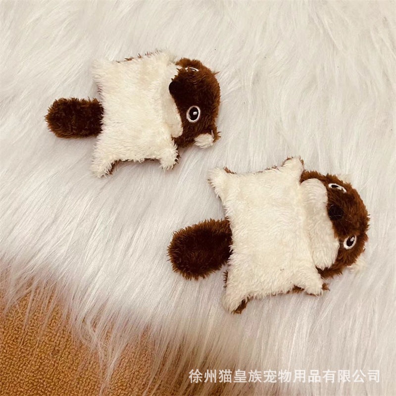 Two brown flying squirrels