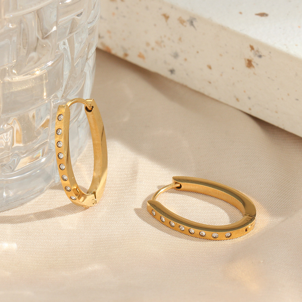 Title 5, Orecchini ovali da donna in acciaio inox con zi...