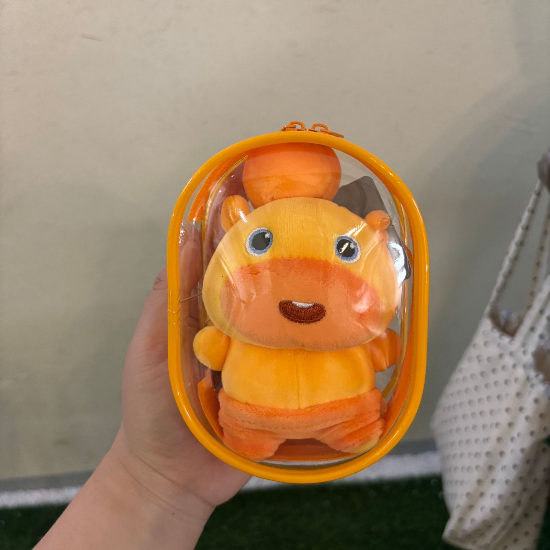 Pull line rotating orange snor + baby bag