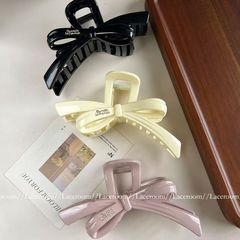甘い気質の蝶結びの髪は女性の高級感をつかみます。