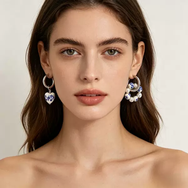 Chinese-style imitation blue-and-white porcelain heart-shaped bead ceramic pendant earrings with a new Chinese design and stainless steel ear hooks