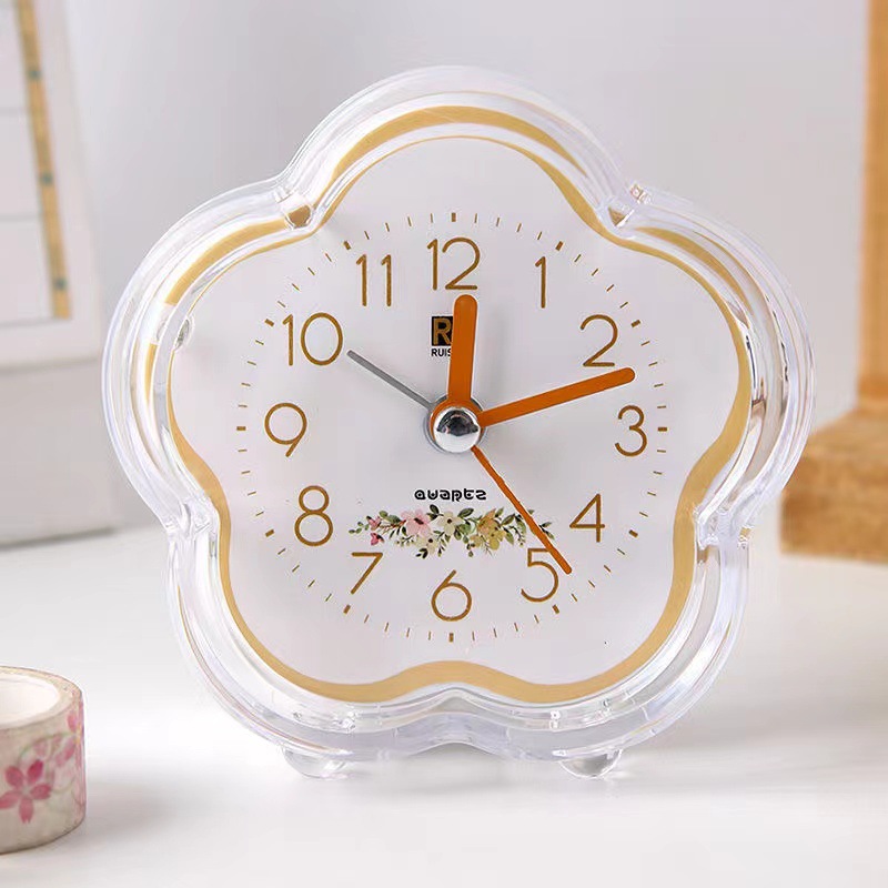 Ventas de fábrica simple reloj de alarma de plástico estudiante reloj de color caramelo con luz en forma de flor de dibujos animados fácil de llevar reloj de alarma
