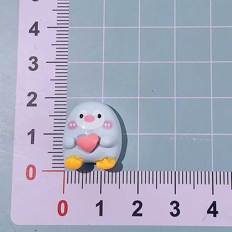 Nuevos accesorios de resina de serie de dibujos animados Happy Dog DIY decoración de cabello pegamento crema agujero de caja de teléfono móvil agujero material de colgante de hebilla