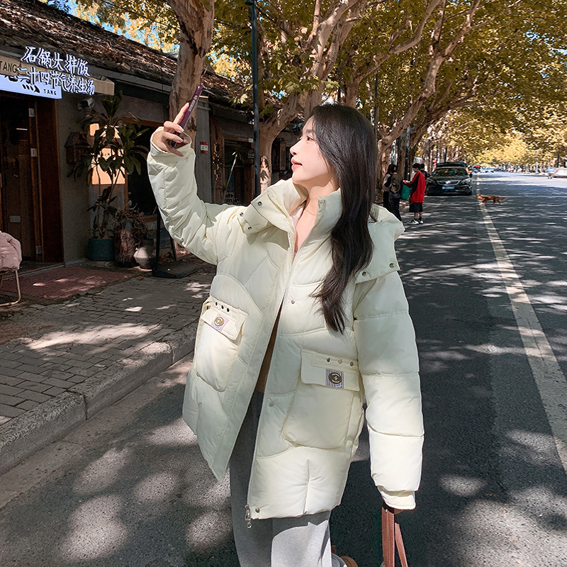 2025 nueva chaqueta de algodón encapuchada de tamaño grande chaqueta de algodón cálida de moda versión casual de algodón grueso chaqueta de mujer gruesa
