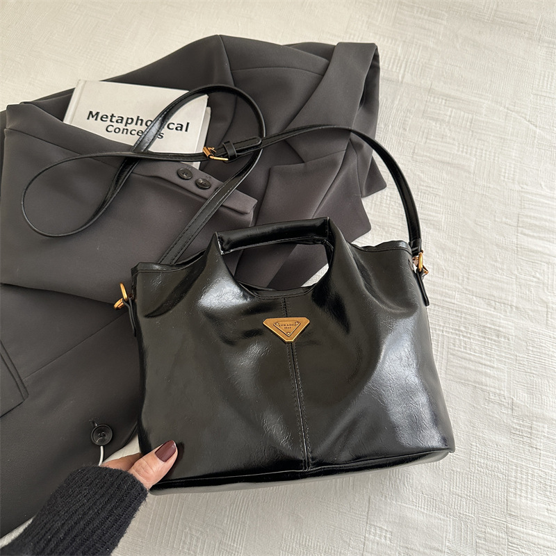 2024 alto valor retrógrado estilo de negocios Meillard bolso de cubo de mano de viaje versátil de invierno nuevo bolso de hombro