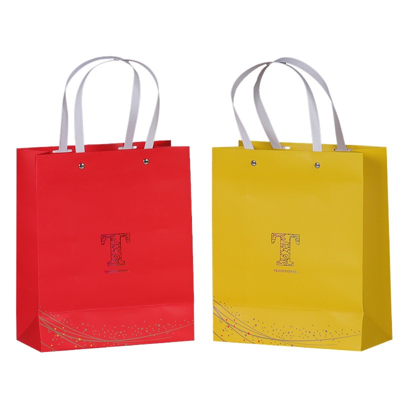 Bolso bolsa de papel al por mayor en stock bolsa de papel bolso de té bolso de boda venta al por mayor moda nacional ins bolsa de regalo bolsa de papel