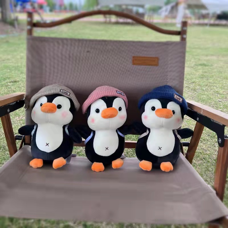 Nuevas lindas mochilas de viaje pingüinos juguetes de peluche muñecas Oceanarium muñecas regalos para niños al por mayor