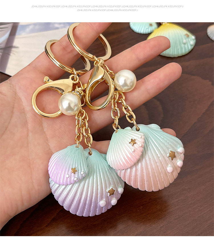 Cute Modern Style Alloy Resin Shell Women's Bag Pendant Keychain display picture 3