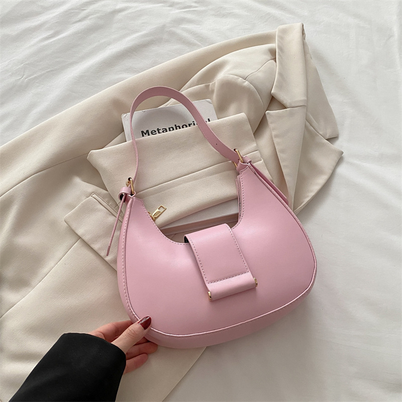 Bolso popular de este año para mujeres 2025, nueva moda de un solo hombro, bolso de diseño de nicho, bolso de media luna debajo de la axila