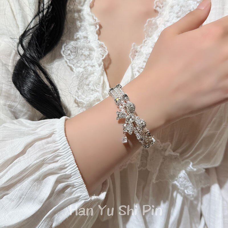 French-style bow multi-layer pearl bracelet 2026 new model, light luxury niche high-end fashion versatile hand accessory French-style bow multi-layer pearl bracelet 2026 new model, light luxury niche high-end fashion versatile hand accessory