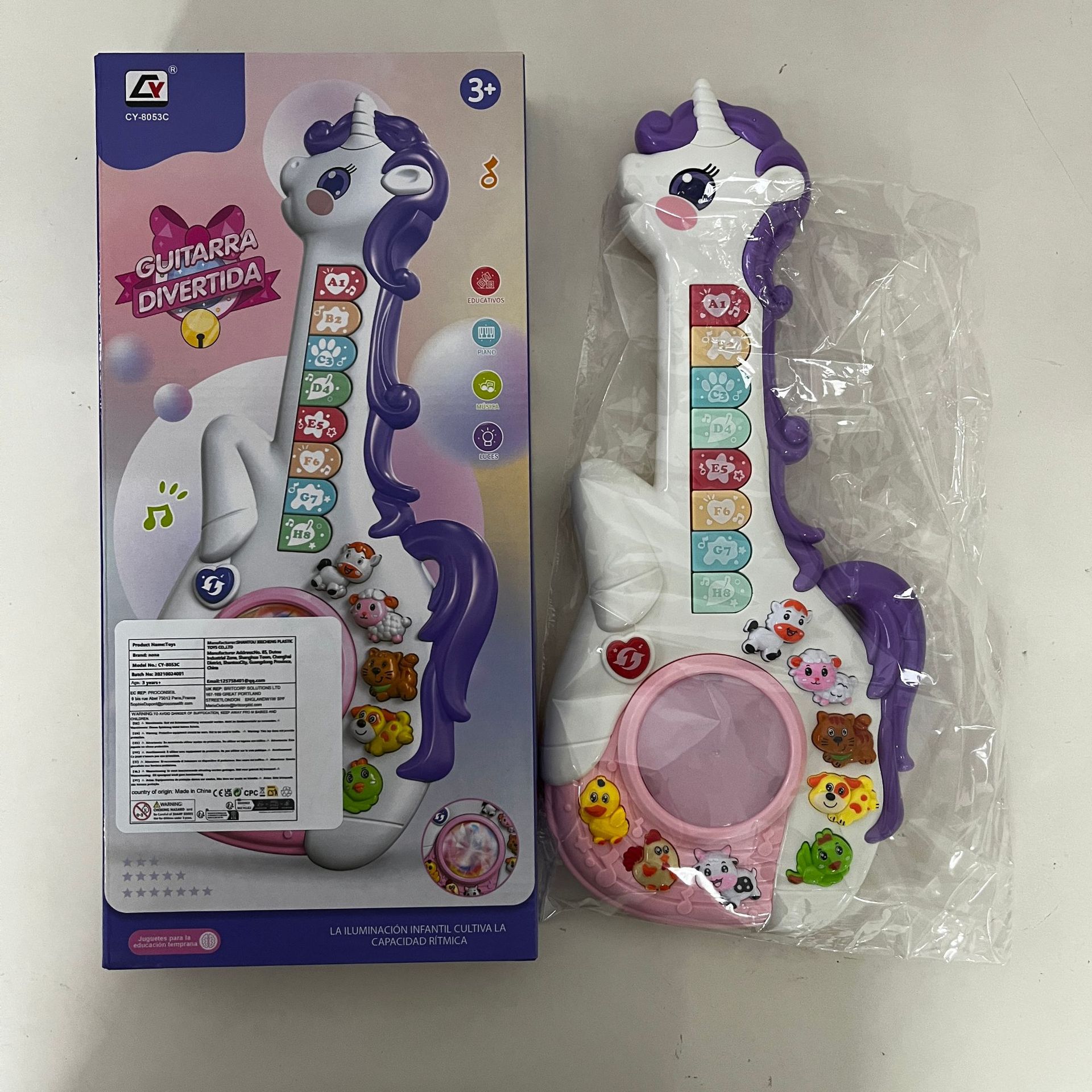 Unicornio de dibujos animados transfronterizos guitarra electrónica puzzle juguetes multifuncionales para la iluminación de la música sonora y óptica instrumentos musicales de educación temprana
