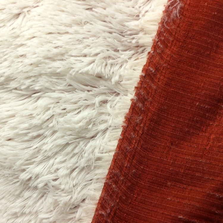 针织经编无光PV绒长毛绒40MM满刮底背印长毛绒PV绒布服装玩具面料