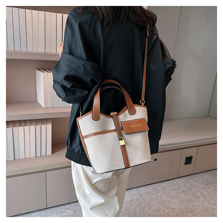 Nicho de diseño retrógrado lienzo portátil bolso de cubo de agua mujer 2026 nuevo cross-border ins canasta de moda bolso de mochila image 8