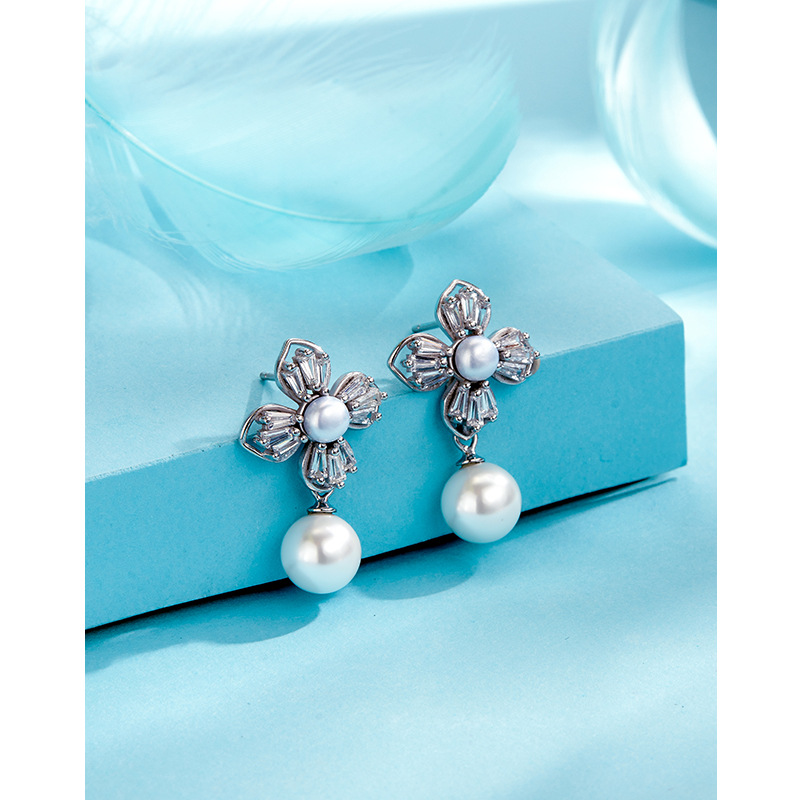 S925 plata esterlina perla Stud pendientes de las mujeres luz lujo nicho diseño elegante rebordear Flor de alta calidad joyería del oído