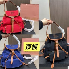 2025 オリジナルレザーインスタイル布とレザーレトロカレッジスタイルミニバックパックレディースバックパック miu 同じバックパック