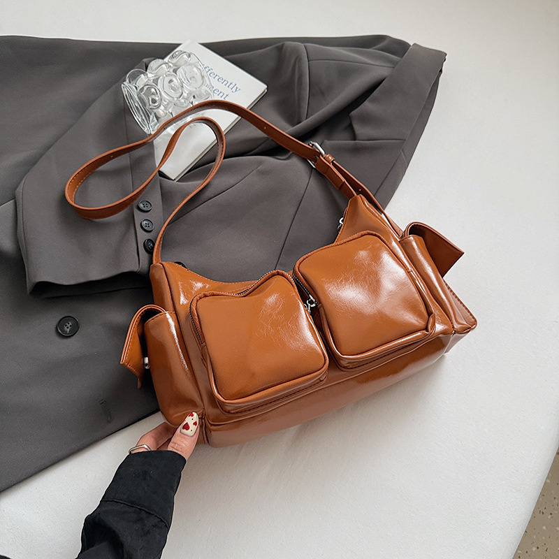 Bolso retro de tendencia transfronteriza para mujeres 2025, nuevo nicho de bolso de locomotiva universal, mochila de textura de alta calidad
