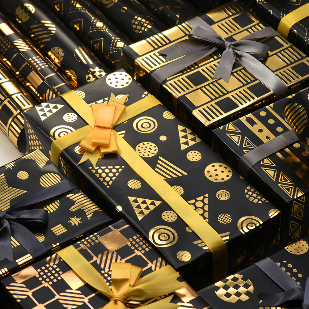 Nuevo papel de embalaje de caja de regalo grueso fondo negro estampado dorado estrella puntos rayas de papel de embalaje de regalo roll