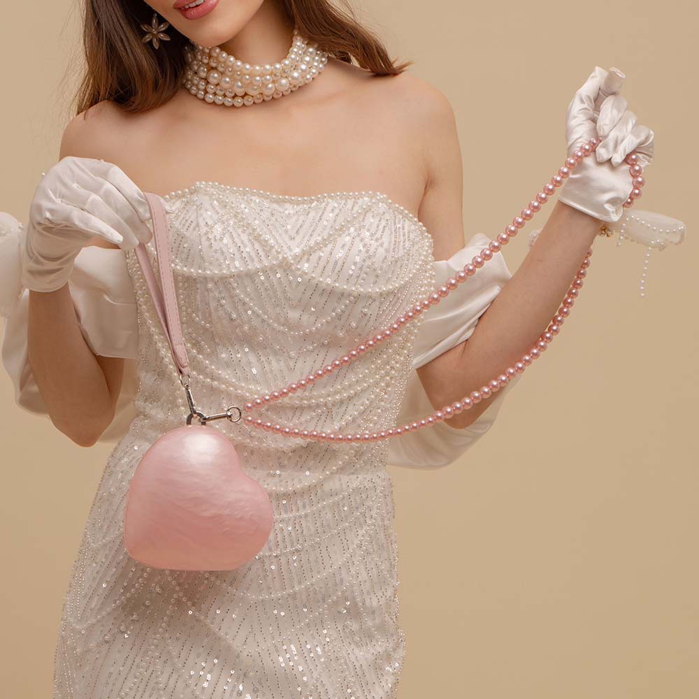 Elegante borsa a mano in acrilico trasparente con cuore pochette sera_voghion.com