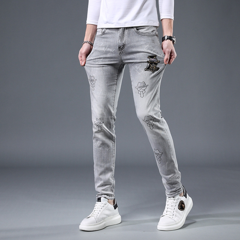 Jeans para hombre nueva tendencia en el verano de 2022 slim y casual marca Joker pantalones de pies grises de perforación caliente marea._voghion.com