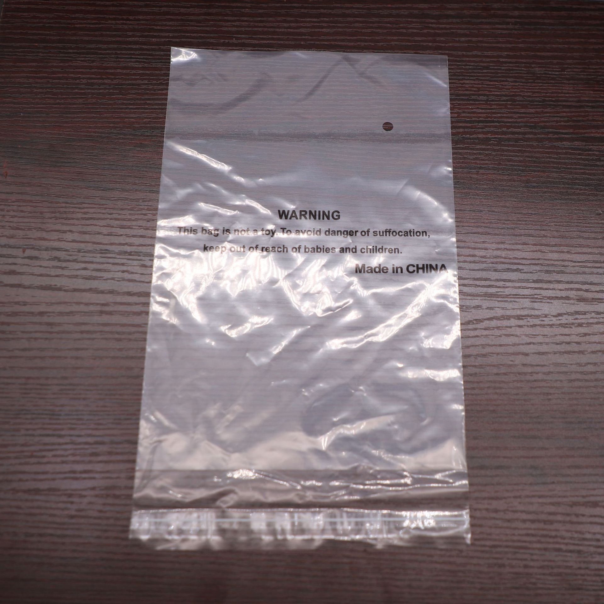 量大从优20*30宠物用品透明塑料袋14号字警告语PE粘贴袋英文警告