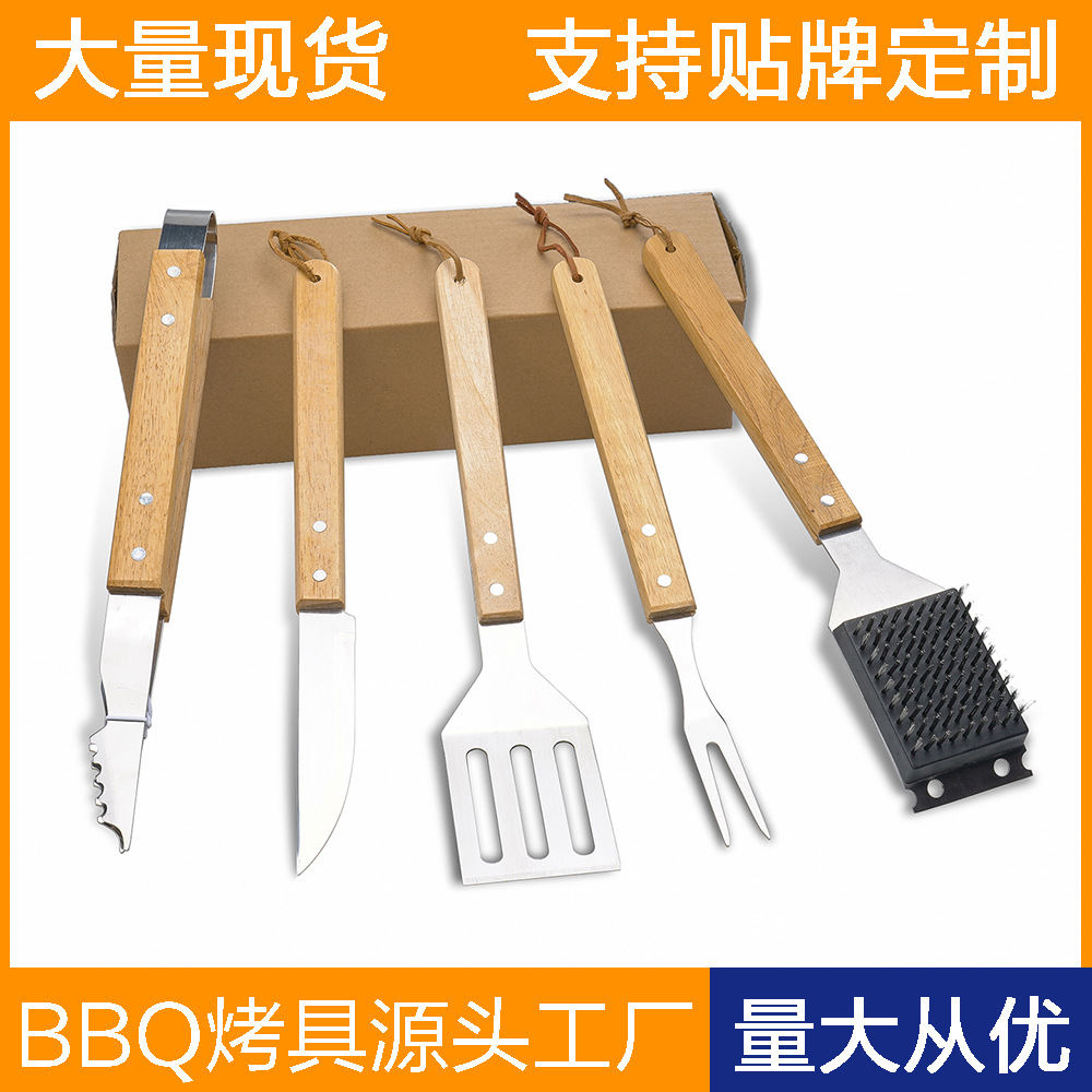 Venta al por mayor Amazon barbacoa herramienta combinación traje de acero inoxidable herramienta para hornear cuchillo pala tenedor clip mango de madera herramientas de cocina