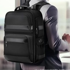 アマゾン工場黒パソコンバッグUSBインターフェースアウトドア旅行ビジネスランドセル大容量防水耐摩耗性