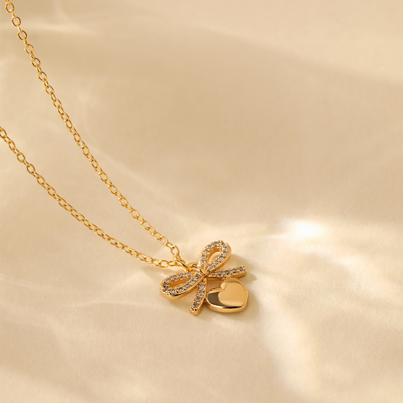 8g Weight 18K Gold Plated Plating Material Copper Pendant Material Zircon Inlay Material Pendant Necklace Classification Copper Chain Material cable chain Chain Type 1 Piece Quantity Daily Occasion Copper Material Heart Shape, Flower, Bow Knot Pattern Women's Gender Inlay Design Sweet Style Copper 18K Gold Plated Inlay Heart Shape Flower Bow Knot Zircon Pendant Necklace 18