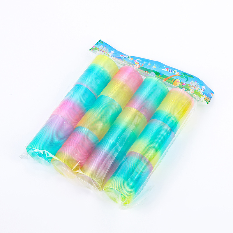 子供の魔力の虹の輪の表情の笑顔の虹のスプリングの輪の露店の弾力の積み重ねの輪の知育のノスタルジックなおもちゃ|undefined
