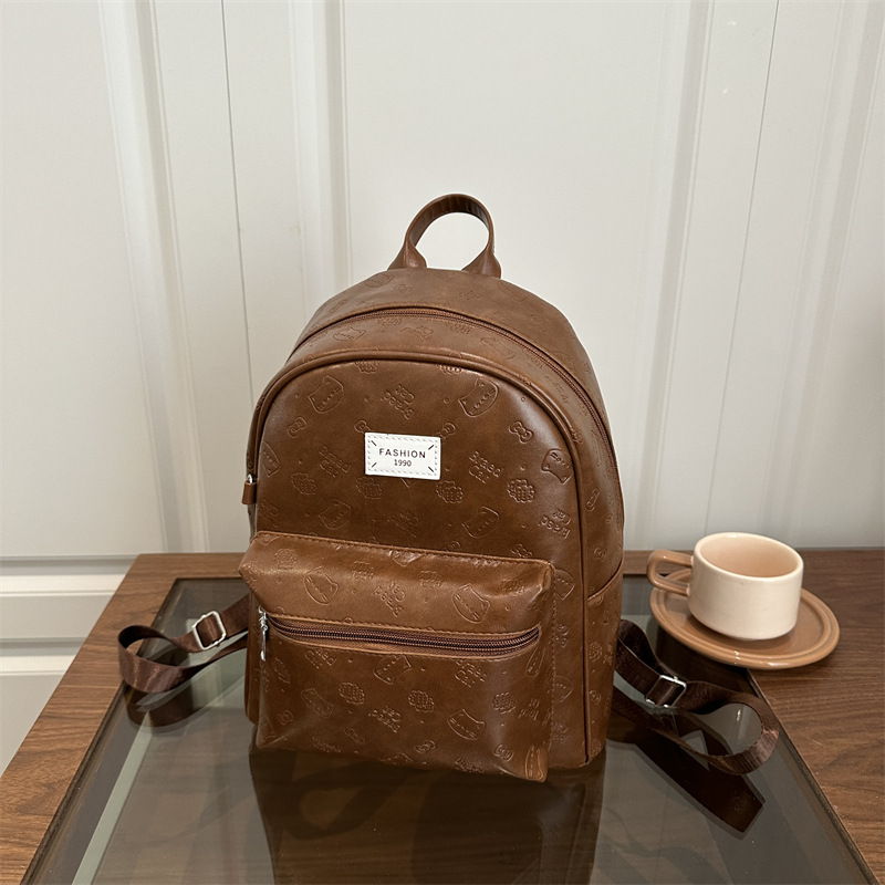 Mochila de nicho coreano para mujeres 2025 nueva moda retro ocio versátil mochila de viaje de estudiantes