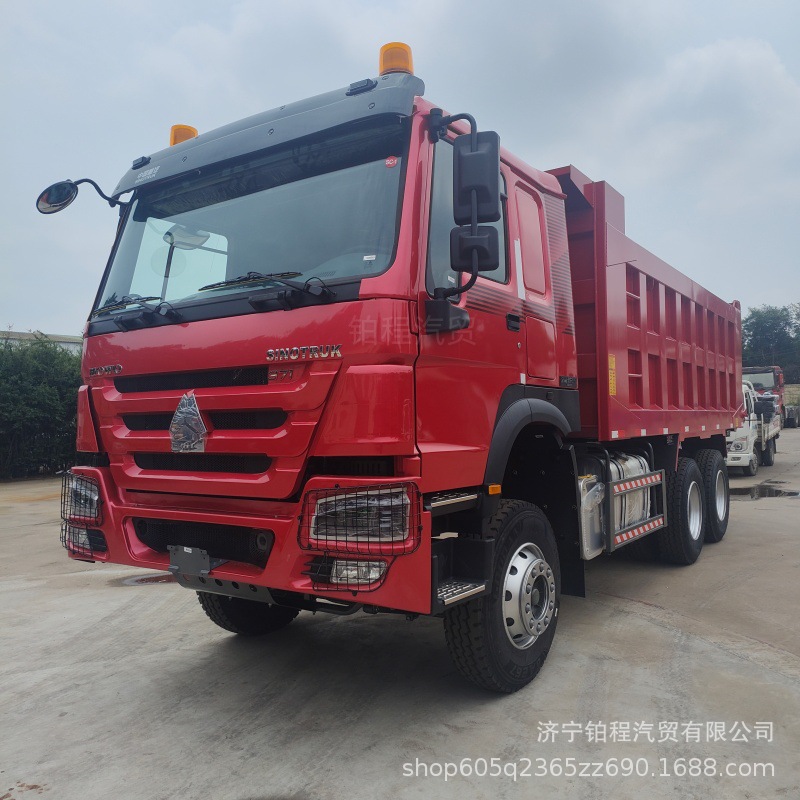 Cross-border export of a brand new China Heavy Duty Truck Howo dump truck with 430 horsepower, 5.6 cubic meters cargo box, 6x4 rear eight-wheel drive