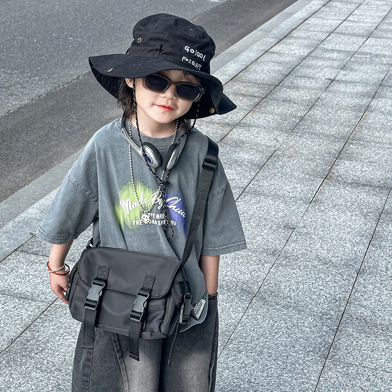 Bolso de hombro para niño simple japonés Bolso de mensajero para niños de color sólido retro 2024 verano nuevo bolso para niños de comercio exterior