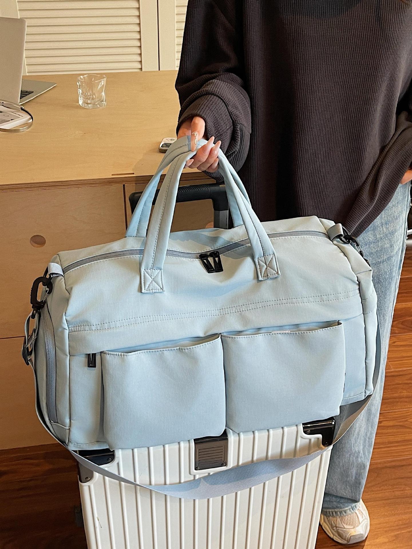 Bolsa de viaje corto de gran capacidad nueva bolsa deportiva de fitness viaje de negocios almacenamiento de embarque de separación seca y húmeda bolsa de mano