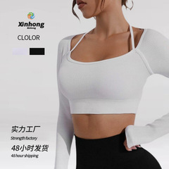 欧米の春と夏の新型のねじのヨガの長袖の上着の女性のヨガは身につけて運動します。